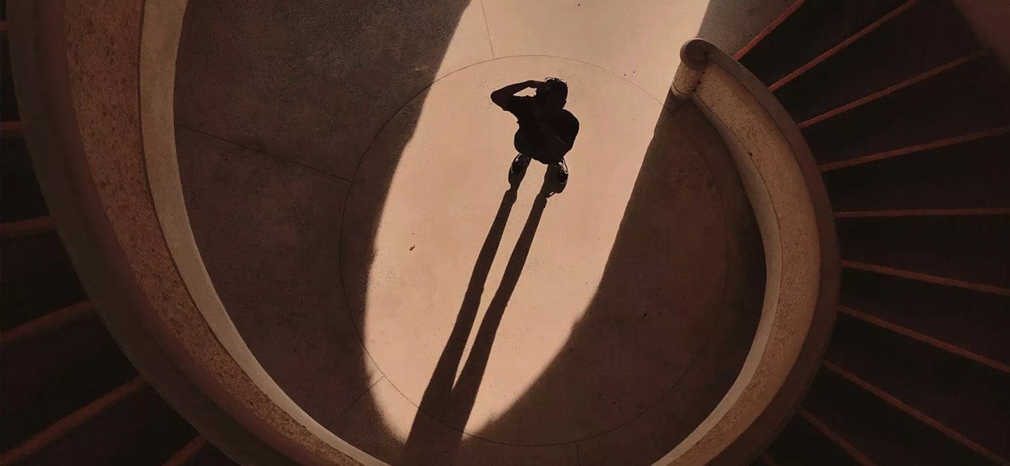 Standing person with shadow
