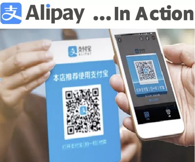 Smartphone scanning an Alipay QR code